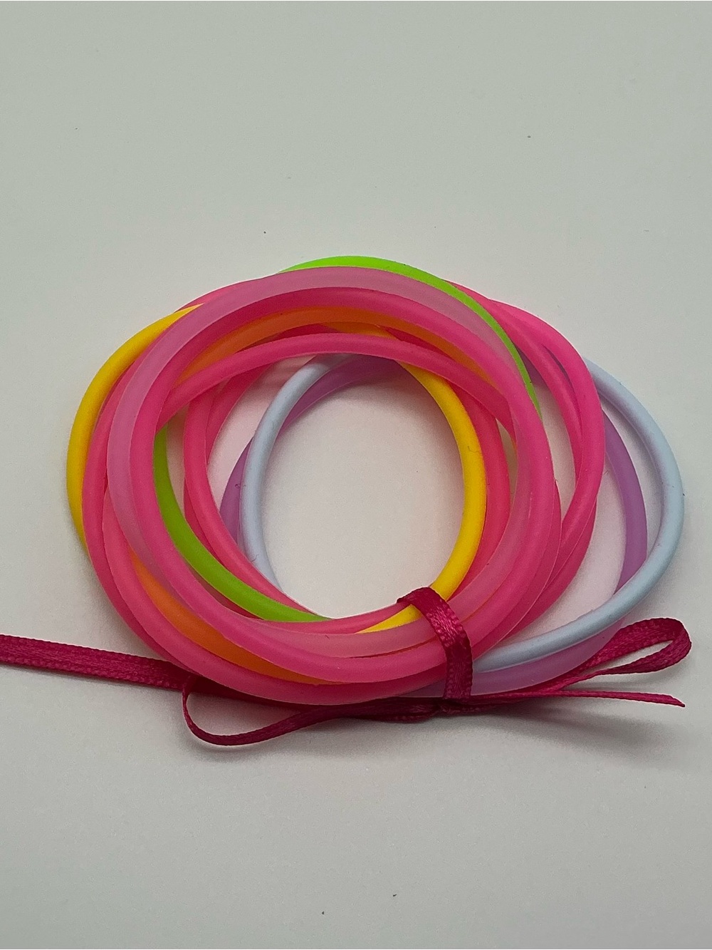 Set of 12 Neon Pink and Pastel Rainbow Colored Jelly Bracelets
